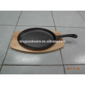 cast iron cookware sizzling pan wood tray